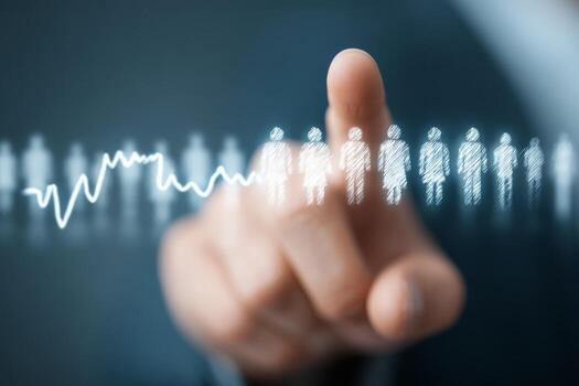 A person pointing at a line of people on a screen photo