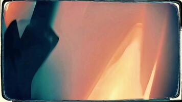 abstrato fluindo tecido com vibrante cerceta e laranja cores criando uma dinâmico efeito video