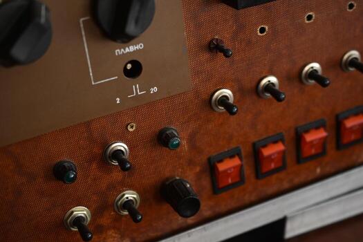 Electrical relay module with coil and contacts. Used in classic signal switching and control operations. photo