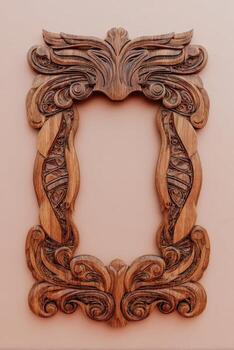Wooden frame with ornate design on it photo
