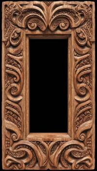 A wooden frame with a carved design photo