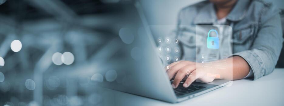 Cybersecurity, data protection, and secure access in corporate tech workspace. Person using laptop with digital overlay of padlock icon and password keypad. photo