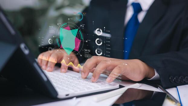 Businessman typing on tablet keyboard with virtual data dashboard, analytics graphs, and infographics, digital transformation and business intelligence concept. photo