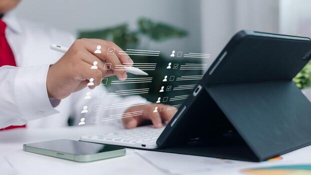 Digital HR management, staff workflow, and paperless human resources system. Customer profile selection and employee checklist interface on digital tablet using stylus. photo