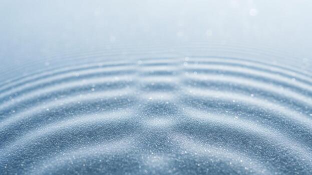 A wave pattern on a surface with a ripple effect photo