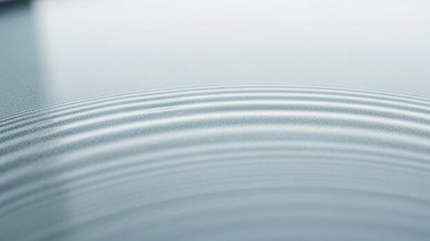 A close up of a circular object with a ripple pattern photo