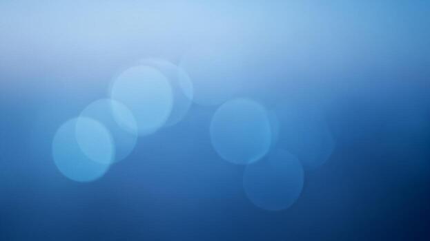 Blue abstract background with blurred circles photo