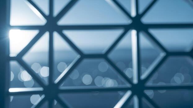 A view of a window with a geometric pattern photo