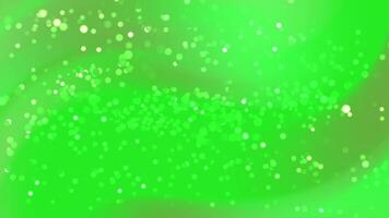 abstracts partiklar abstrakt grön bakgrund med gnistrande bokeh partiklar skapar en magisk och festlig atmosfär video