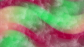 abstracts rök abstrakt bakgrund animering med strömmande grön, röd, och vit färger skapande en drömmande effekt video