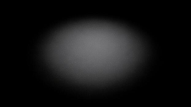 A black background with a white light in the center photo