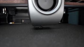 A 3D printer nozzle in action, creating intricate designs for modern technology enthusiasts and DIY projects video