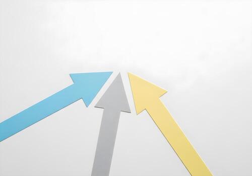 Three arrows drawn on paper converging into one direction representing visual metaphor of teamwork alignment, cooperation, and shared goal photo