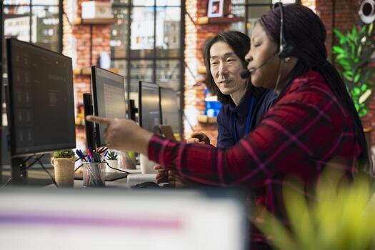 Team of multiethnic call center agents using AI to enhance customer interaction and resolve inquiries efficiently. Multiracial customer support coworkers using AI communication technologies photo