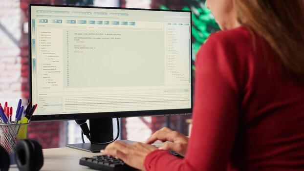 Freelancer typing commands into a futuristic AI chatbot to help solve tasks, artificial intelligence demonstrates the power of automation and virtual assistance for efficiency. Camera A. photo