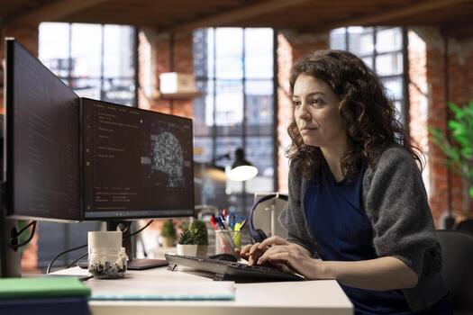 hembra eso ingeniero haciendo mantenimiento en artificial inteligencia sistemas, sentado a oficina escritorio. joven mujer trabajos como un desarrollador con cibernética y algoritmos para máquina aprendiendo. foto