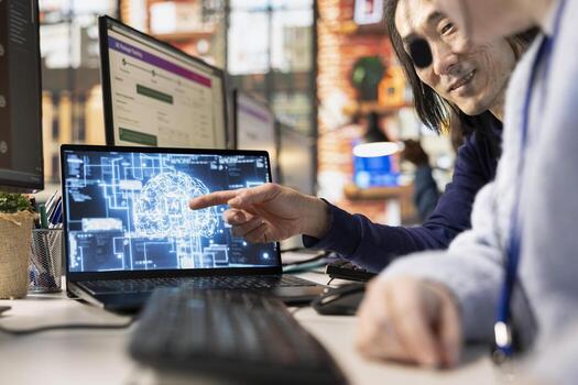 Call center coworkers at office desk using AI to generate call scripts during conversation with customers. Customer support colleagues doing brainstorming, using AI to summarize clients issues photo