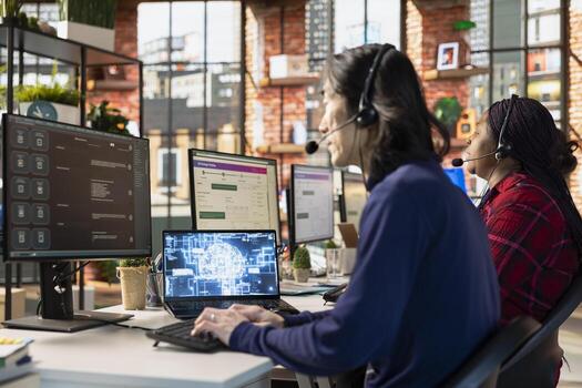 Team of multiethnic call center workers at office desk using AI to generate call scripts during conversation with customers. Multiracial customer support employees using AI to summarize clients issues photo