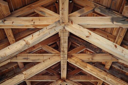 Structural wooden beams and temporary flooring at building site. Authentic construction progress image showing skeleton of future structure photo