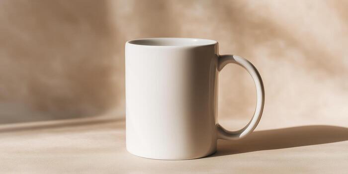 The white ceramic mug is highlighted against a neutral background with soft natural shadows and is ready for branding or text overlay. Panoramic banner. photo
