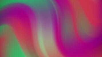 Abstracts Abstract gradient background with vibrant swirls of green, pink and red creating a dynamic and modern look video