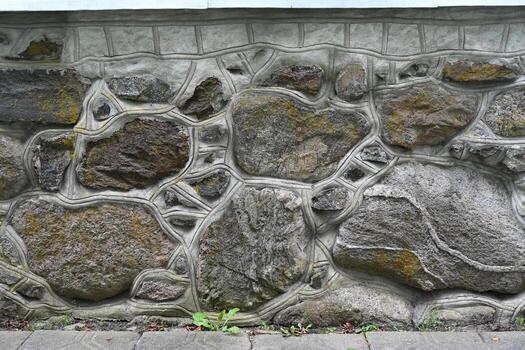 a wall with a fire hydrant on it photo