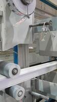 Window frame moving on automated conveyor belt in factory video