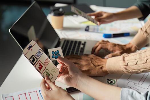 Creative UX UI Design Process with Team Collaboration and Digital Interface Prototypes in Modern Workspace photo