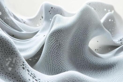 A close up of a white fabric with holes photo