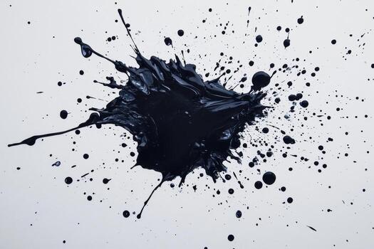 A black ink splash on a white background photo