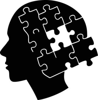 Silhouette of a Head Filled with Puzzle Pieces Representing the Mind and Intellect vector