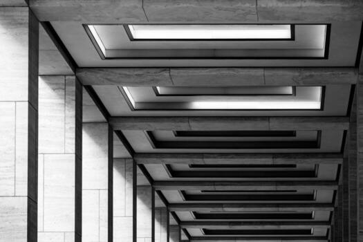 Architectural Abstract with Receding Patterns and Lights Creating a Geometric Symmetry in a Modern Building Interior photo