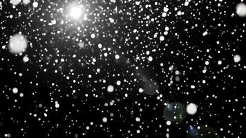 Elegant shimmering white sparkles with soft glow on pure black background video