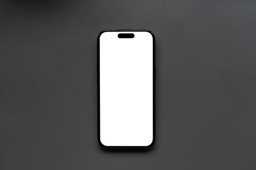Modern Smartphone with Blank White Screen on a gray background. for showcasing mobile app designs, website layouts, or any digital content. The blank screen offers a versatile canvas for designers. photo