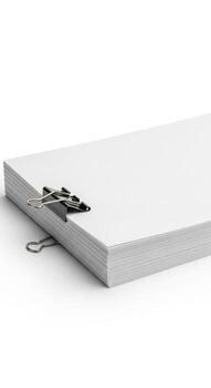 Stack of white paper sheets held by a black clip isolated on white background photo