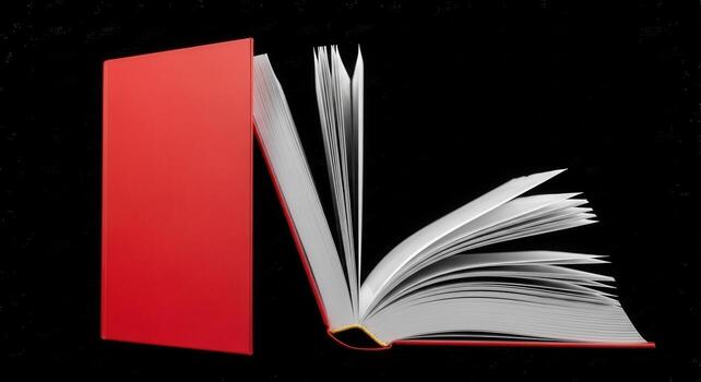 An open red book with pages fluttering against a dark background photo