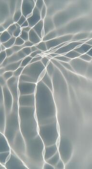 Abstract pattern of light reflecting on water surface photo