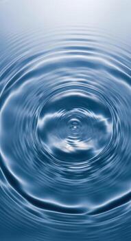 Vertical view of water ripples from a drop photo