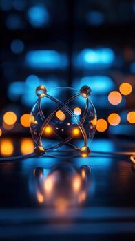 Illuminated atom model on dark surface, bokeh background photo