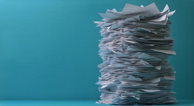 Stack of Disorganized Paper on Blue Background Highlighting Clutter and Disarray in Workspace photo