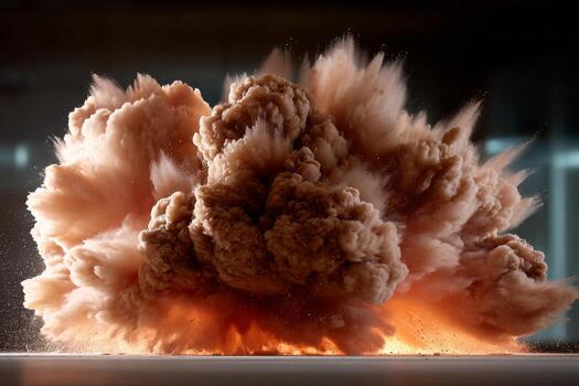 A large explosion of smoke and dust photo