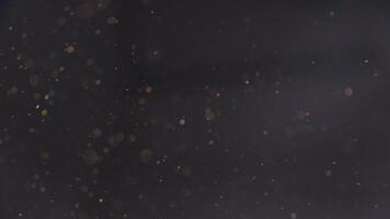 flutuando poeira partículas dentro uma Sombrio ambiente. abstrato espaço textura. bokeh efeito em microscópico elementos para fundo cenas video