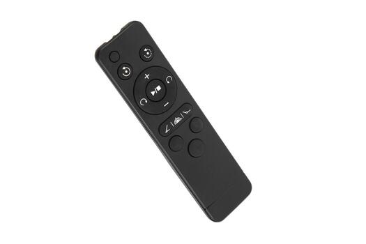 A black remote control with various buttons, shot from an angle. Wireless remote control for a gadget photo