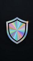 Iridescent shield symbol on a dark background photo
