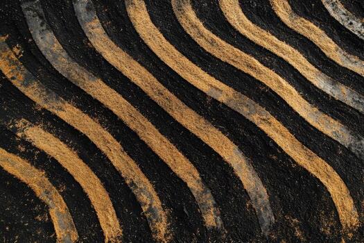 A close up of a black and gold pattern photo