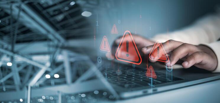 Cyber security concept, Hands typing on laptop with red cybersecurity warning icons overlay, symbolizing data breach, hacking risk, malware attack, and online security threat in digital network. photo