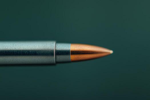 Centerfire Rifle Bullet frozen in Flight with Blurring at the Tip Point photo