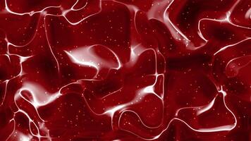 Glossy red fluid pattern with smooth waves and scattered light specks video