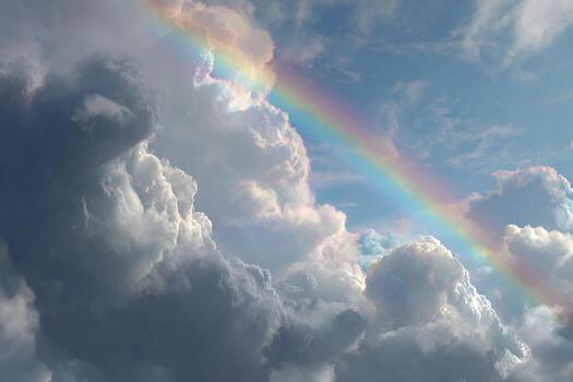 Realistic cloudy sky with a bright rainbow appearing after the rain creating a calm and colorful atmosphere photo