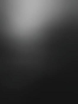 A soft, blurred image featuring shades of gray, creating a minimalist and abstract atmosphere.A dark gradient bright black wallpaper. vector